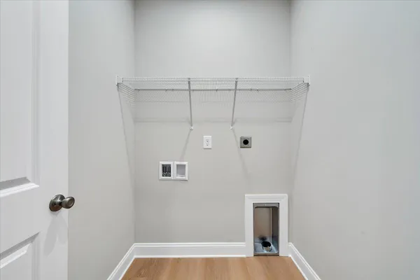 a view of a hallway with closet