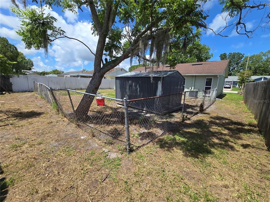 3406 Murrow Street New Port Richey, FL 34655 - Photo 18 of 21 a view of backyard of the house