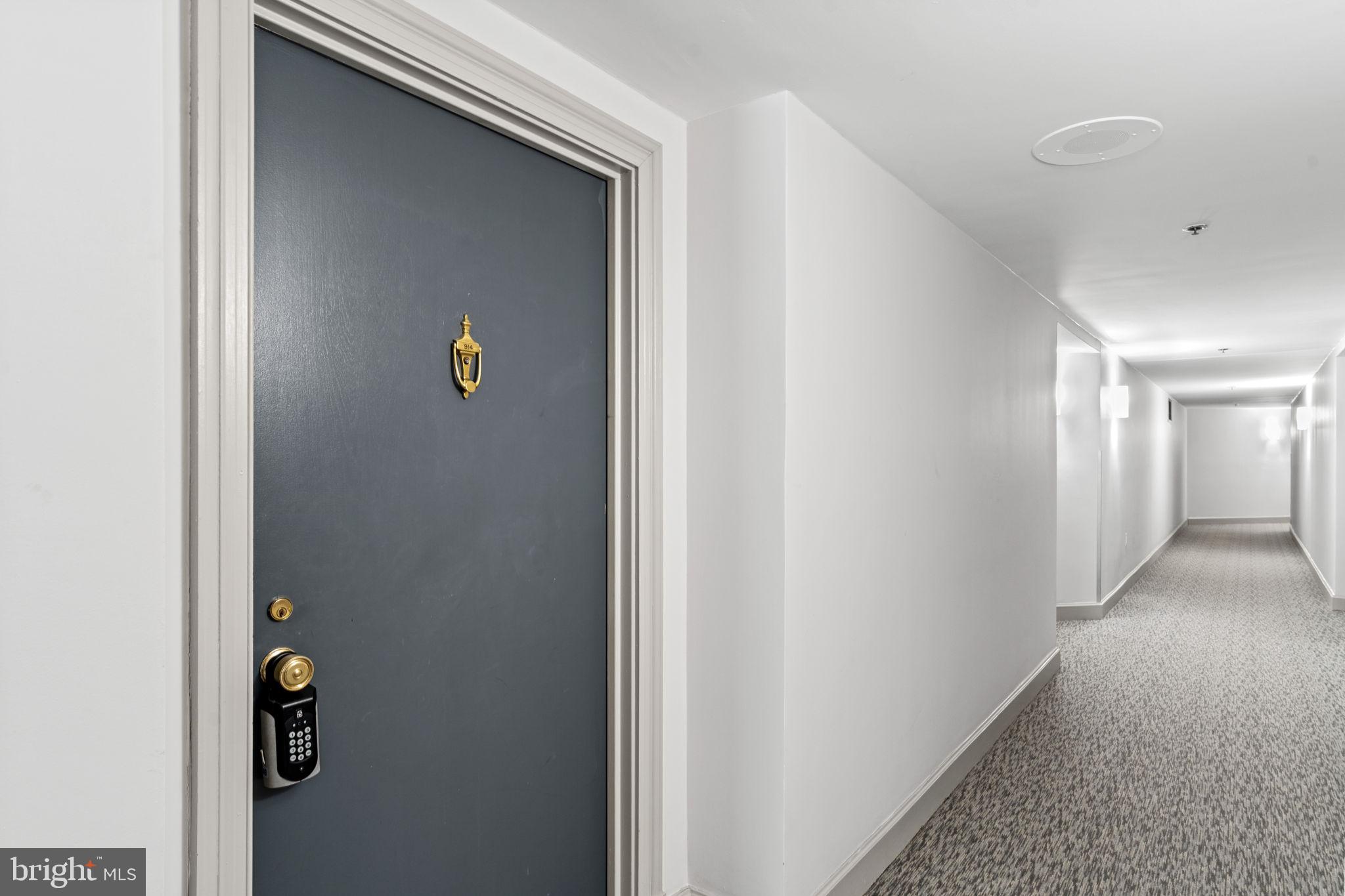 1301 North Courthouse Road, Unit 914 Arlington, VA 22201 - Photo 6 of 50 a view of hallway with wooden floor