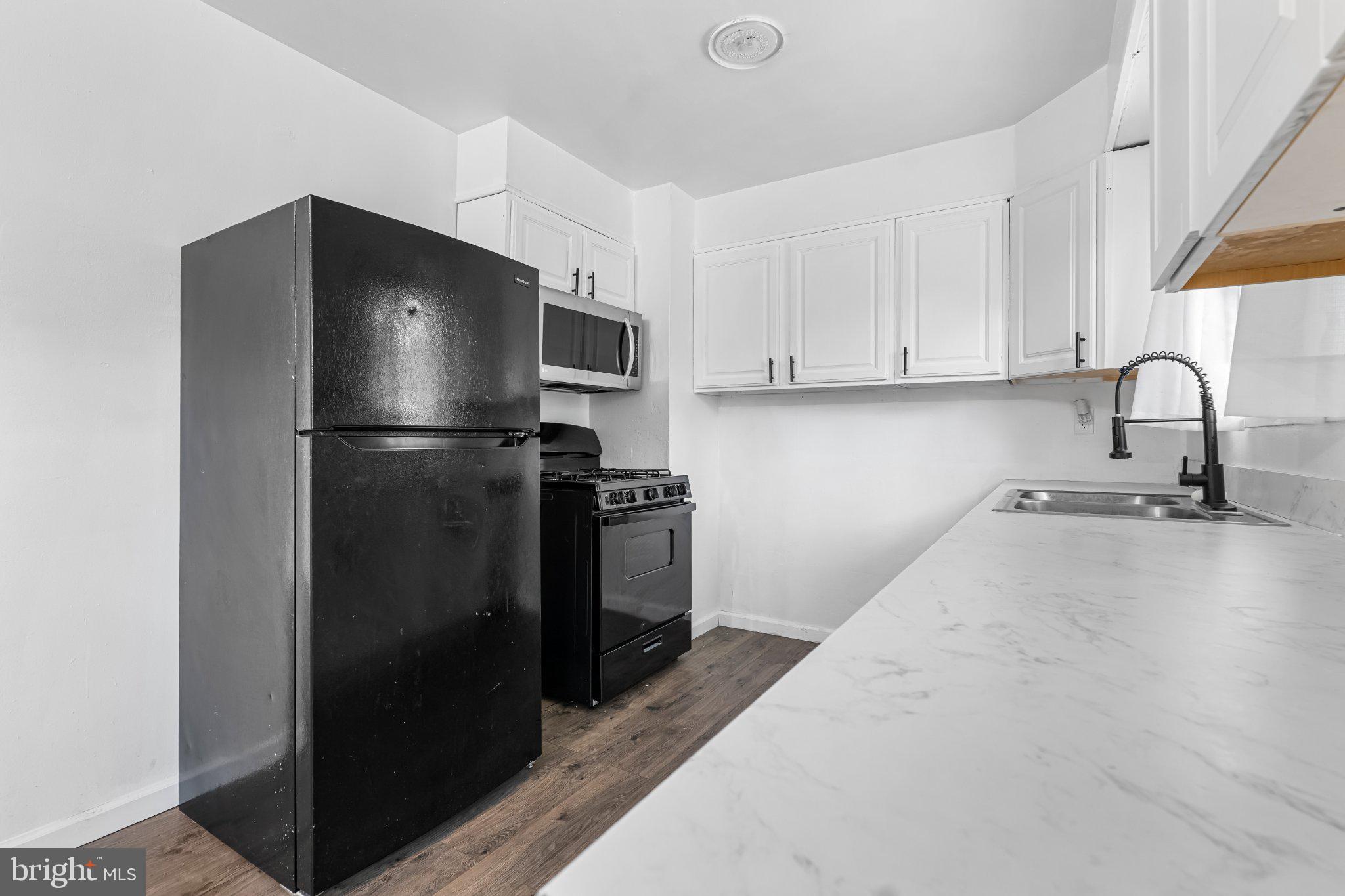 329 David Hall Road Dover, DE 19904 - Photo 14 of 17 Modern kitchen with sleek appliances.