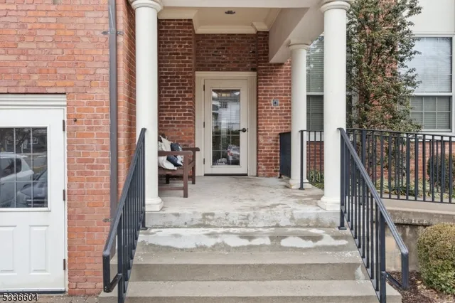 a view of a street with cars