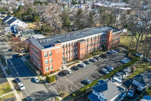 a view of swimming pool with outdoor seating