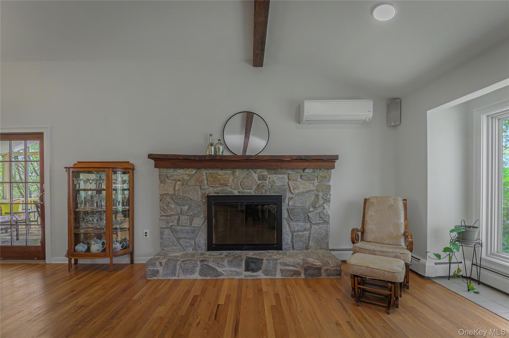 41 Cross Pond Road Pound Ridge, NY 10576 - Photo 8 of 41 a living room with furniture and a fireplace