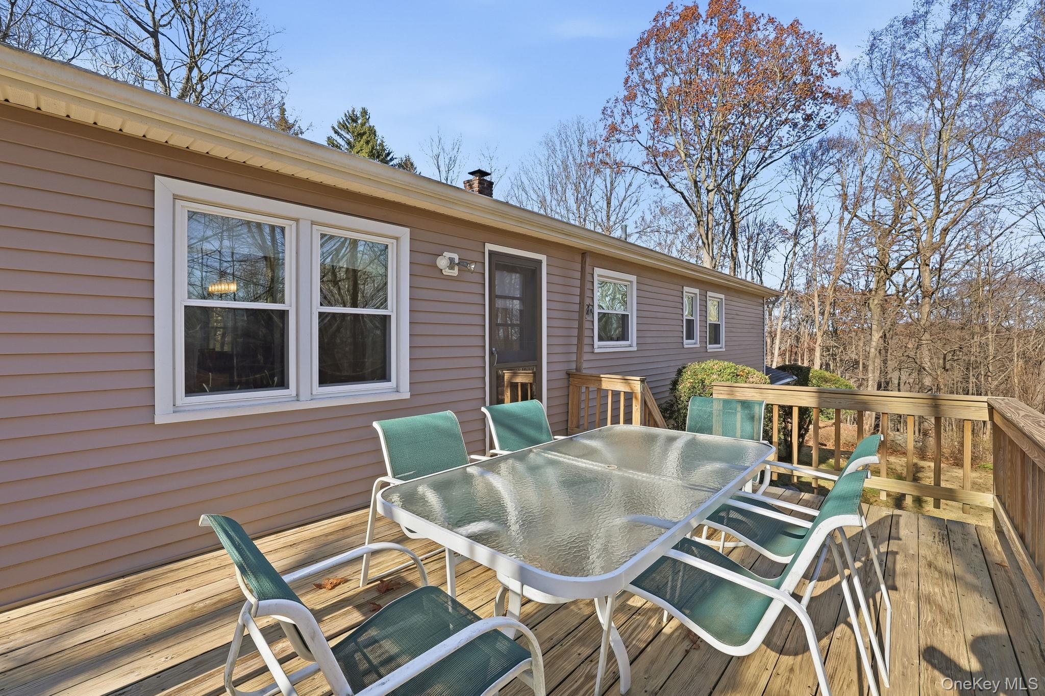 42 Bayberry Hill Road Mahopac, NY 10541 - Photo 33 of 49 Wooden deck featuring outdoor dining space