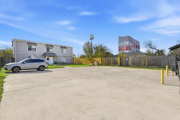 a house with a parking space in front of it