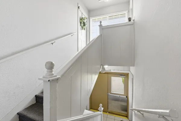 a view of a hallway with entryway