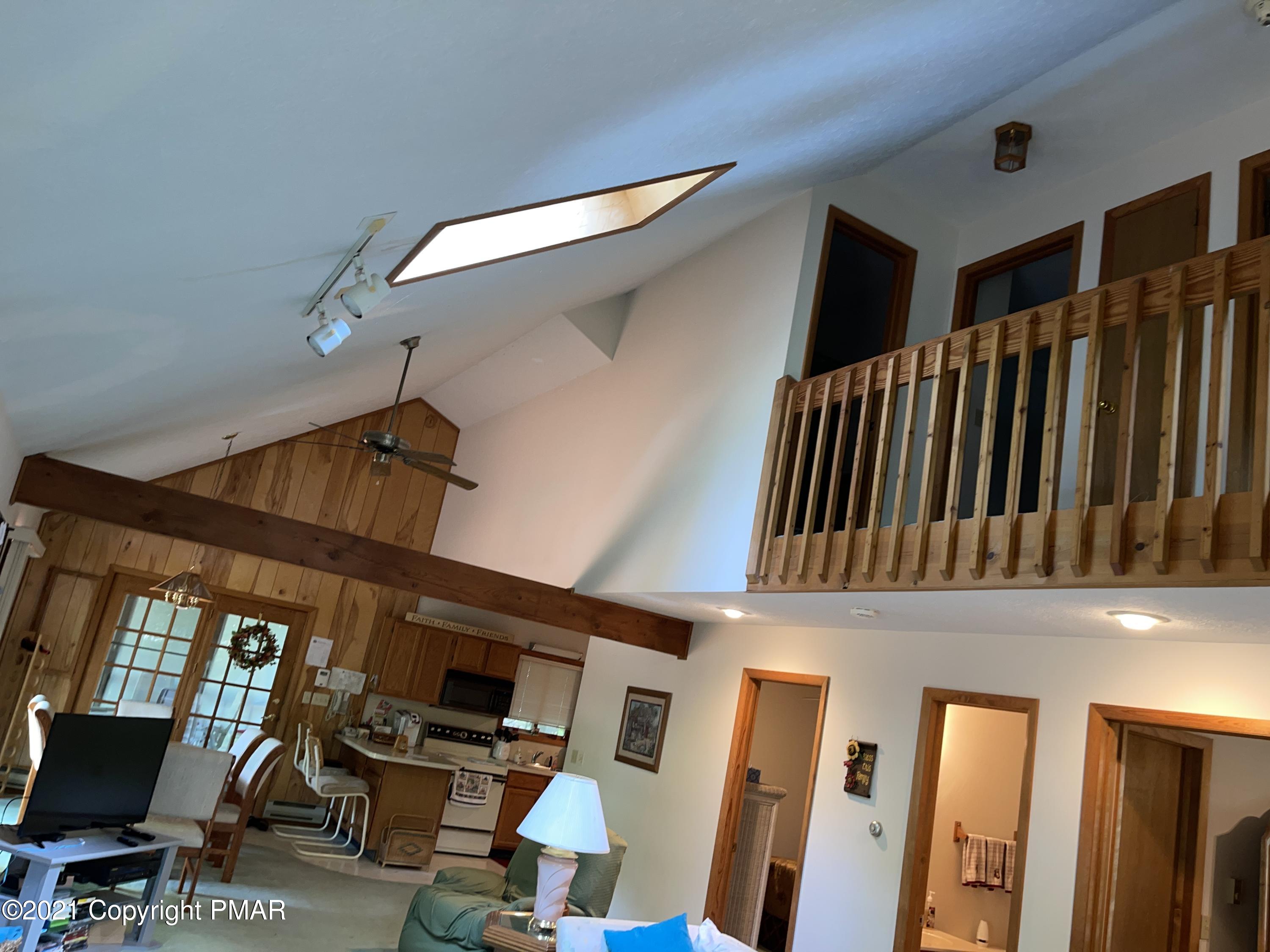 139 Dunchurch Drive Bushkill, PA 18324 - Photo 19 of 37 a view of entryway and hall with wooden floor