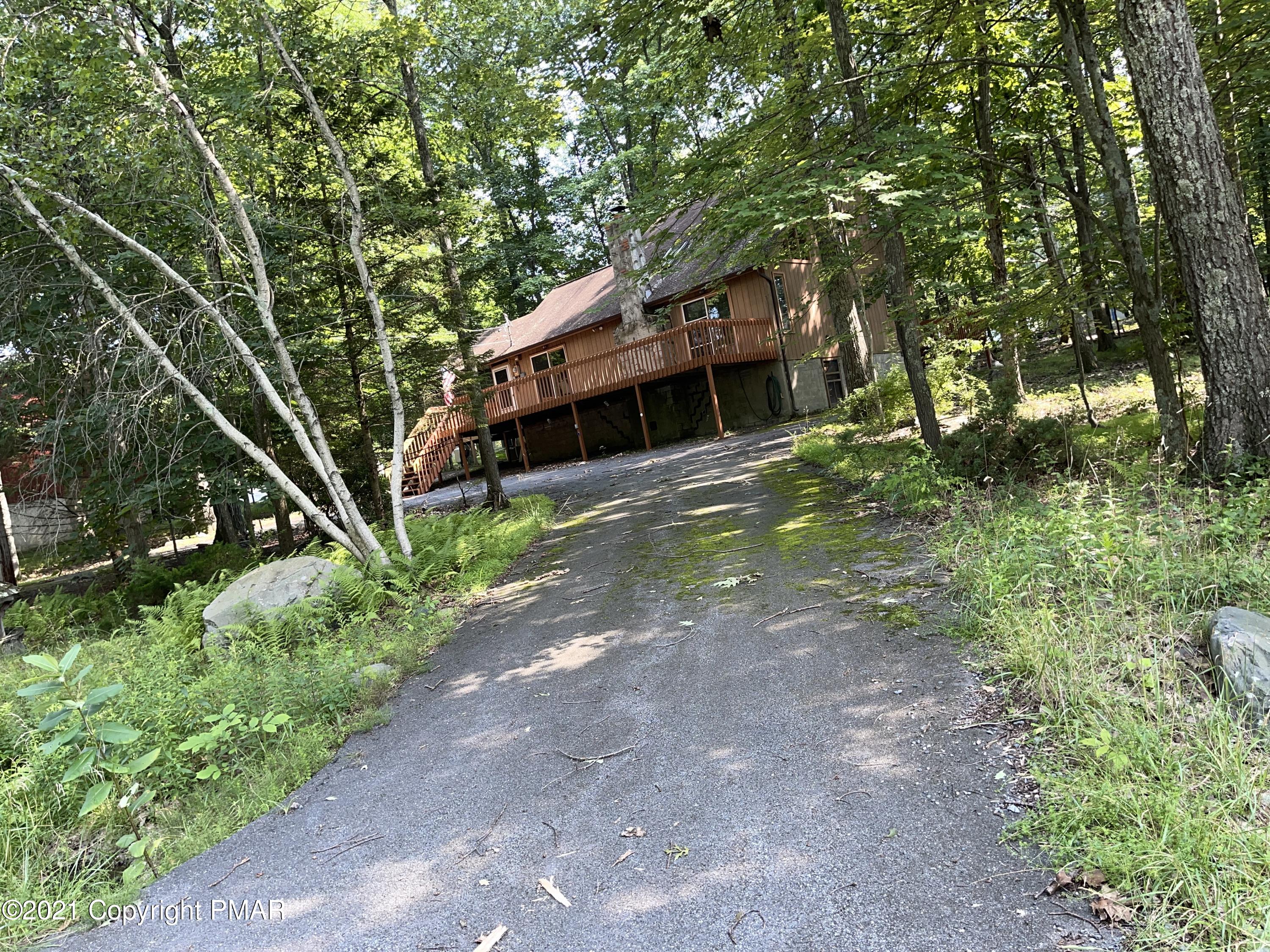 139 Dunchurch Drive Bushkill, PA 18324 - Photo 2 of 37 a backyard of a house with lots of green space