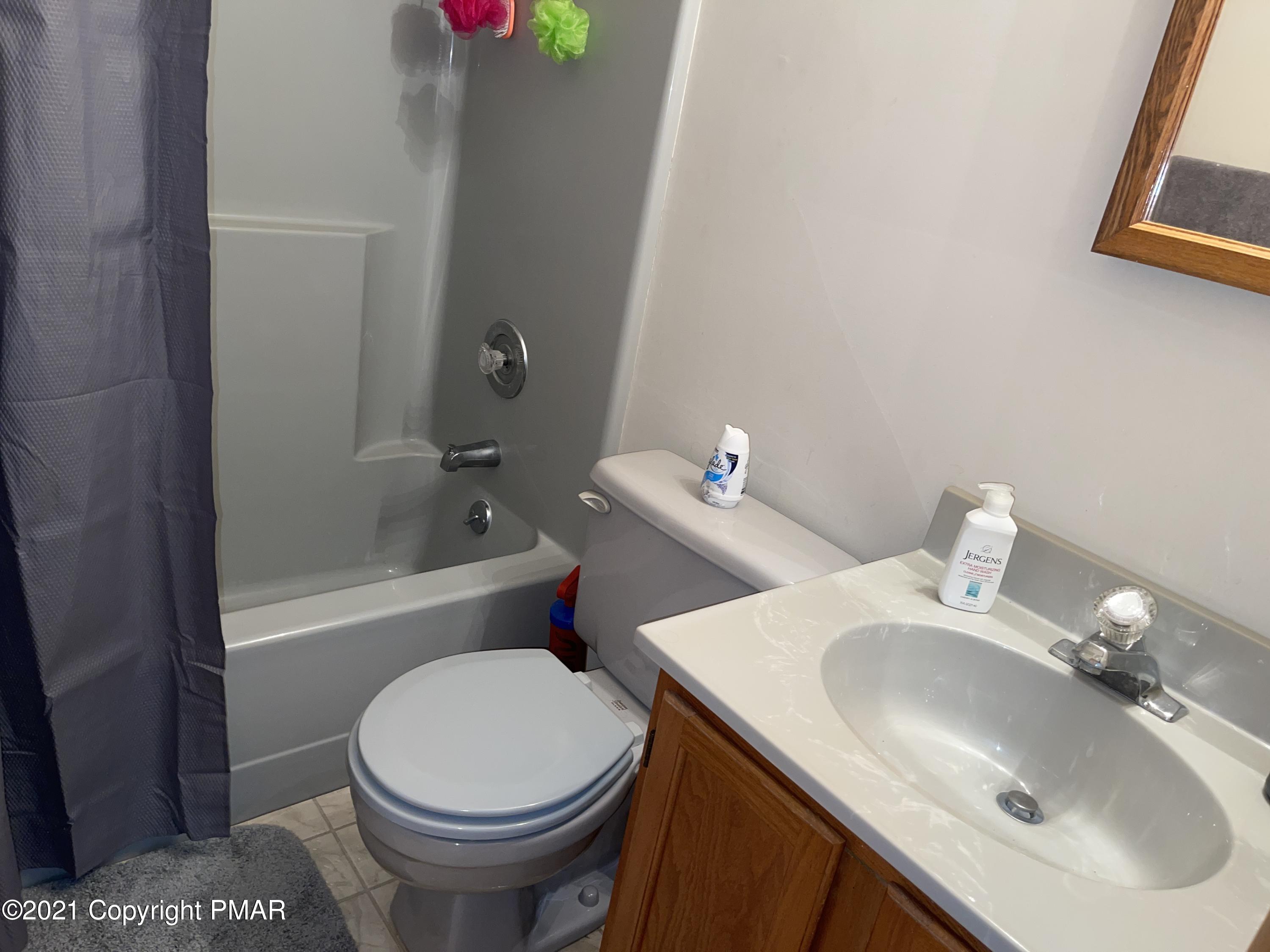 139 Dunchurch Drive Bushkill, PA 18324 - Photo 23 of 37 a bathroom with a sink toilet and shower