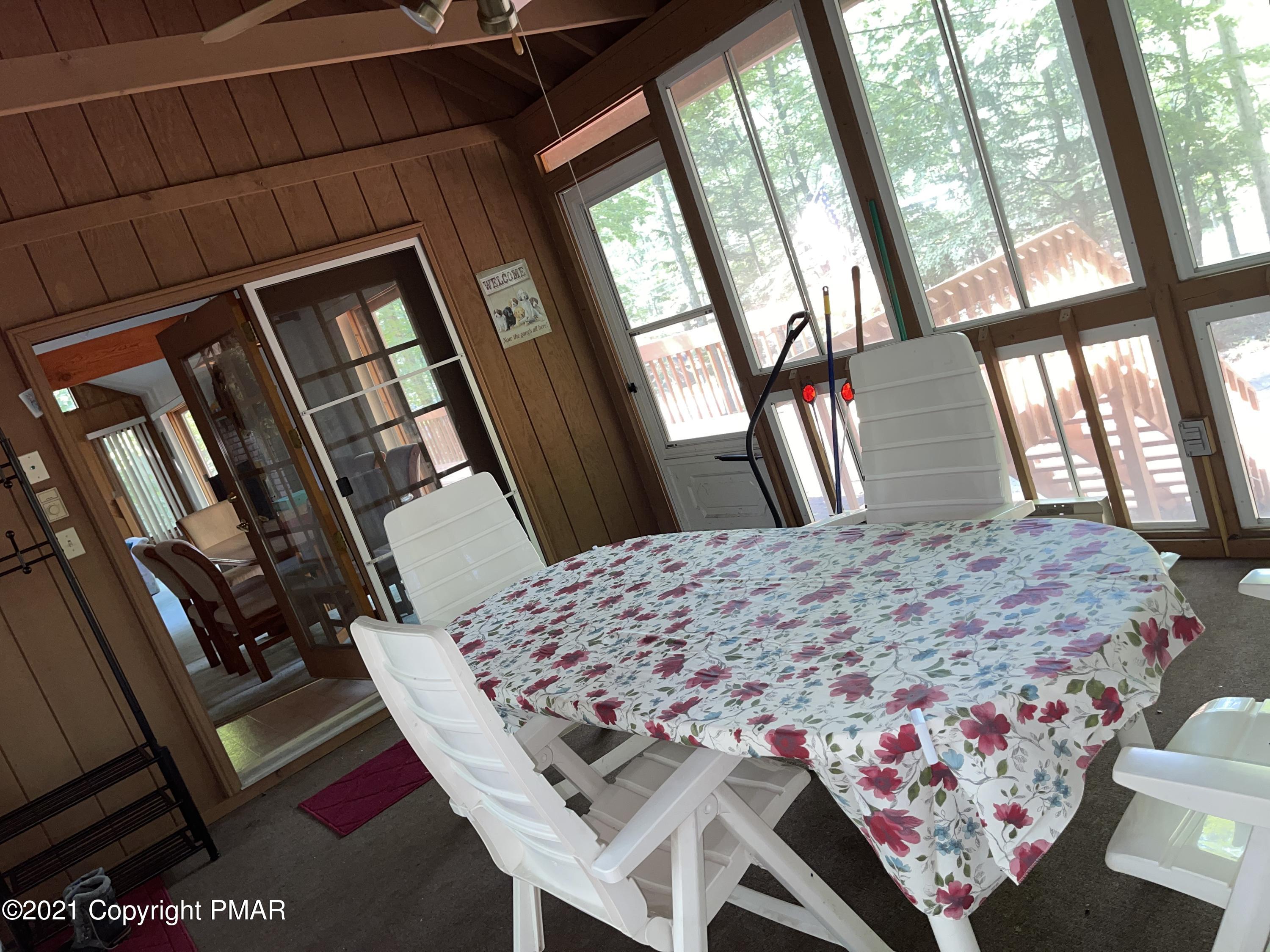 139 Dunchurch Drive Bushkill, PA 18324 - Photo 27 of 37 a bedroom with a bed and a large window