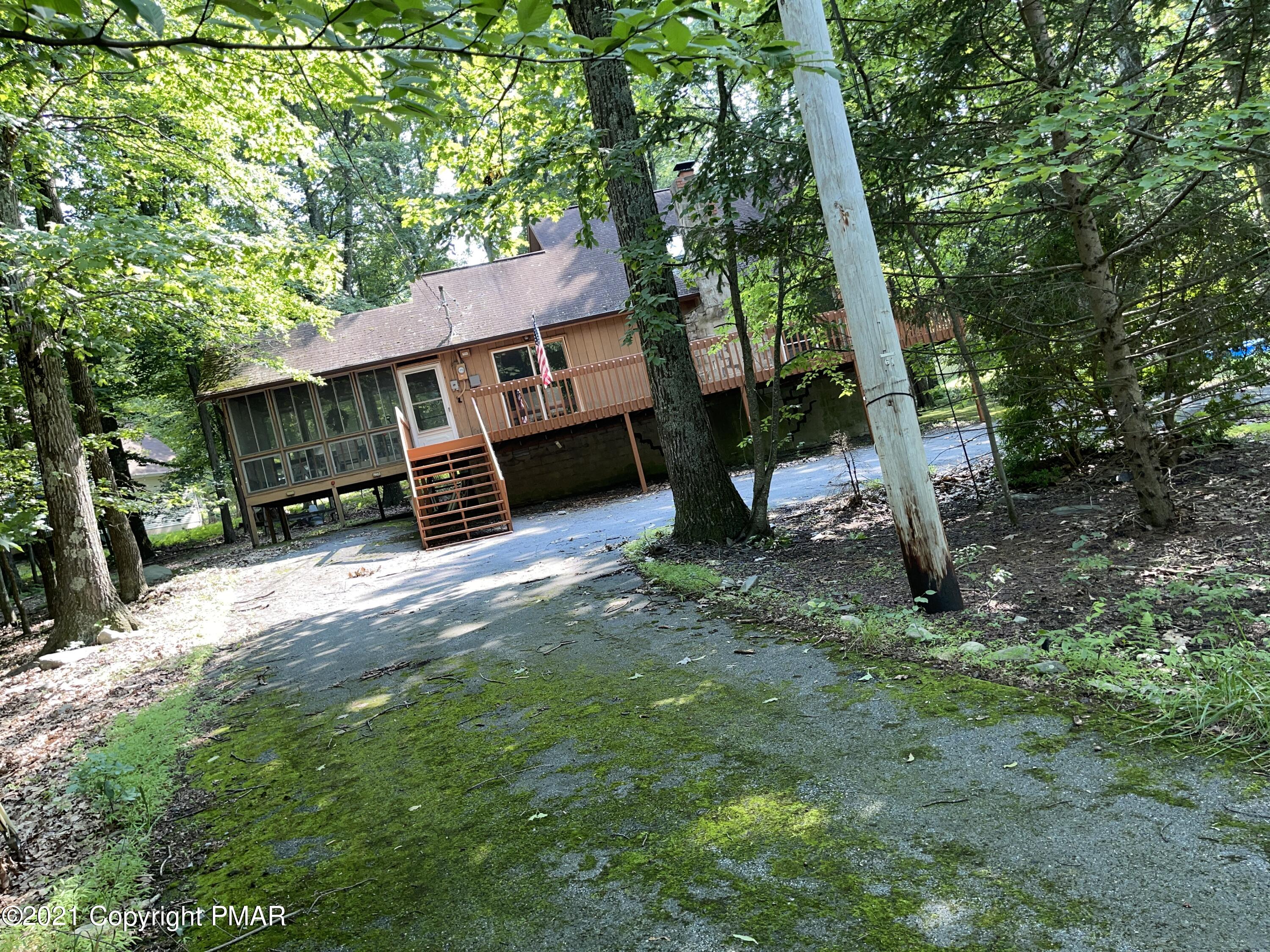 139 Dunchurch Drive Bushkill, PA 18324 - Photo 28 of 37 a view of a house with a backyard