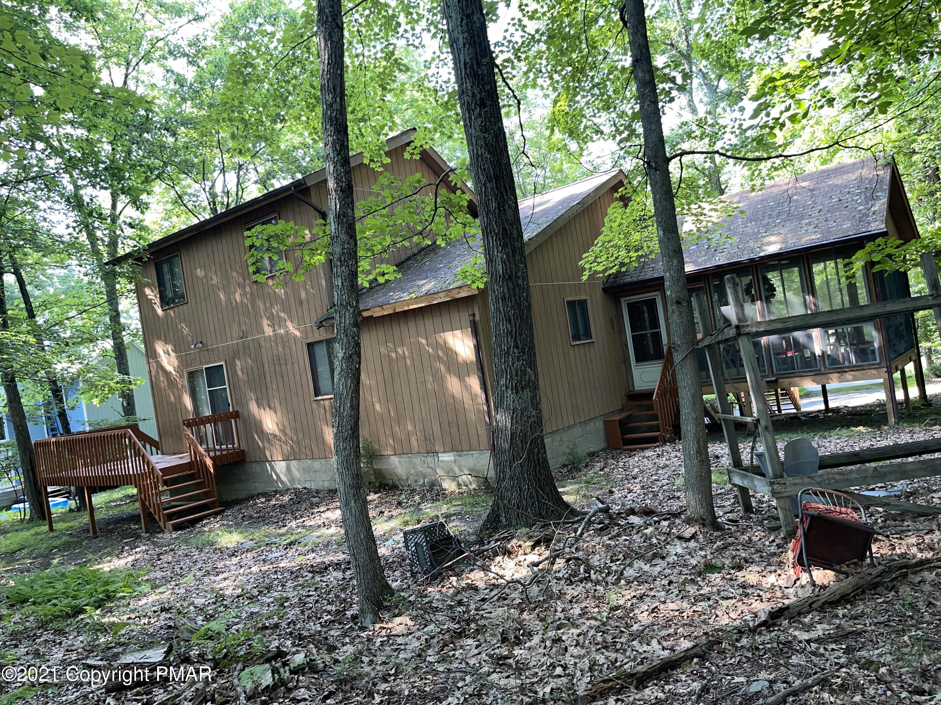 139 Dunchurch Drive Bushkill, PA 18324 - Photo 31 of 37 a view of a chair and table in backyard