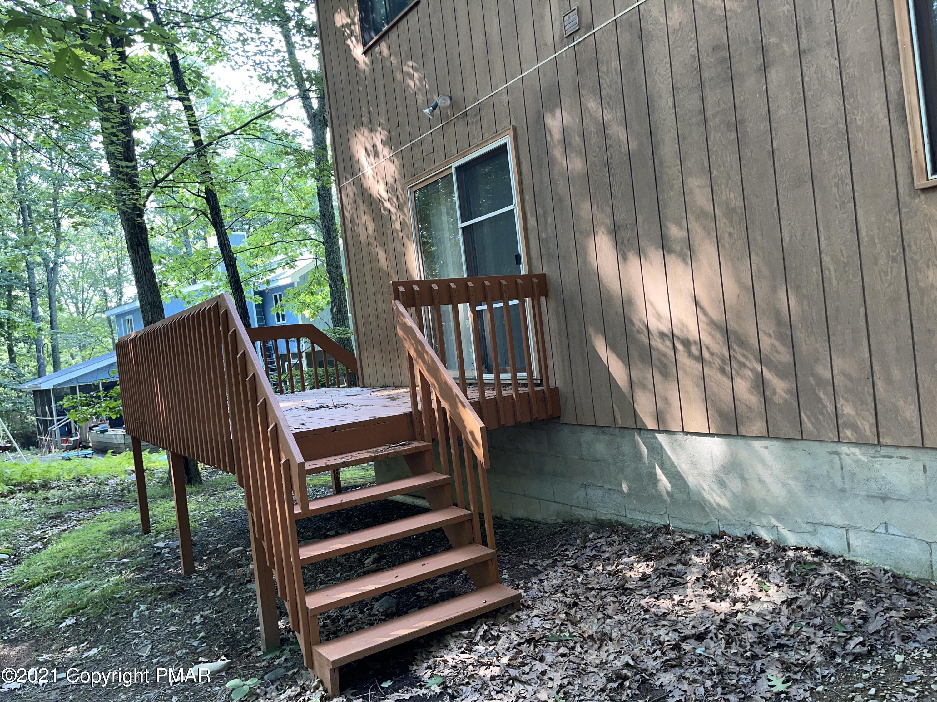 139 Dunchurch Drive Bushkill, PA 18324 - Photo 32 of 37 a view of a backyard with sitting area
