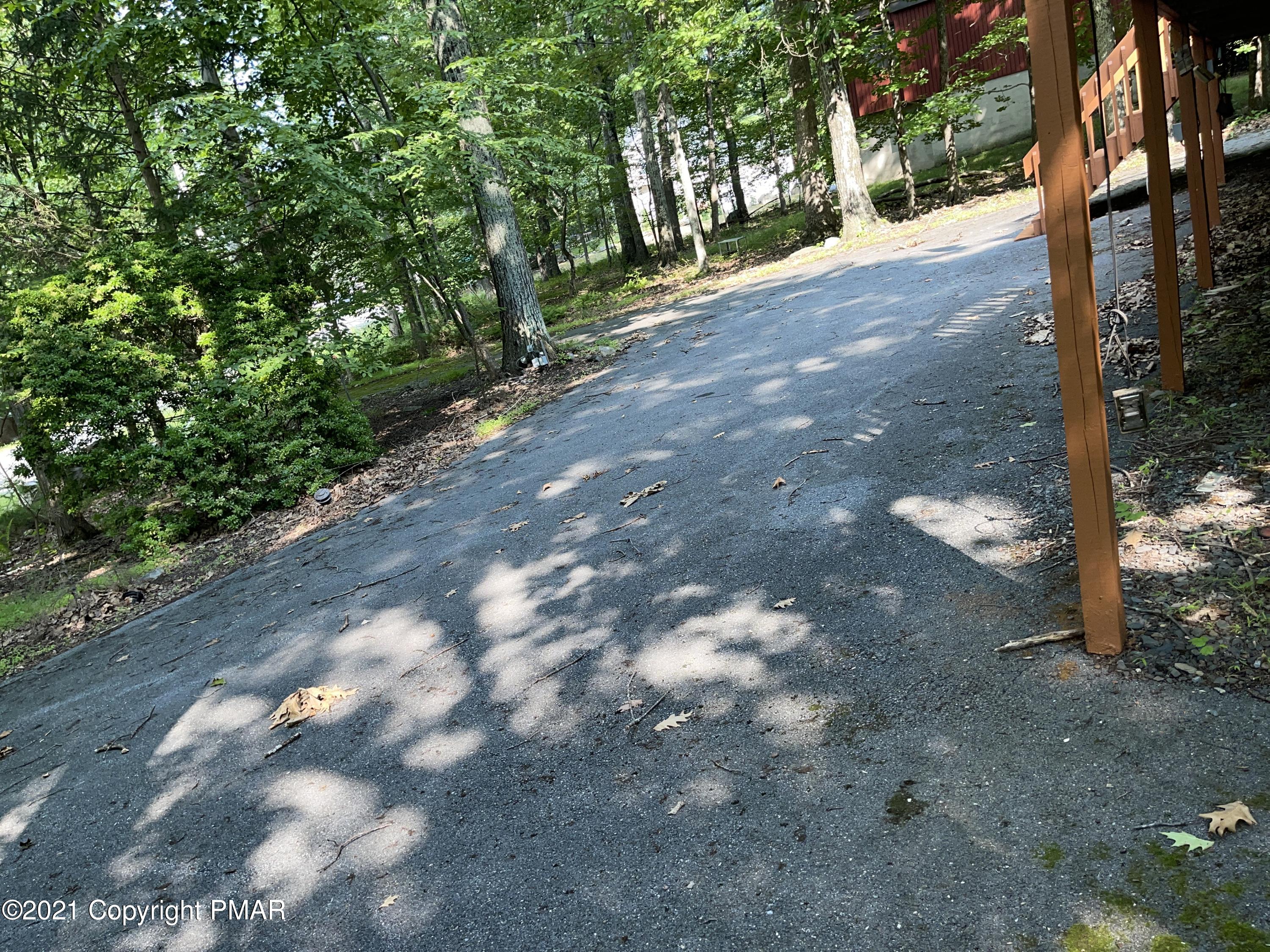 139 Dunchurch Drive Bushkill, PA 18324 - Photo 36 of 37 a view of a street with a trees