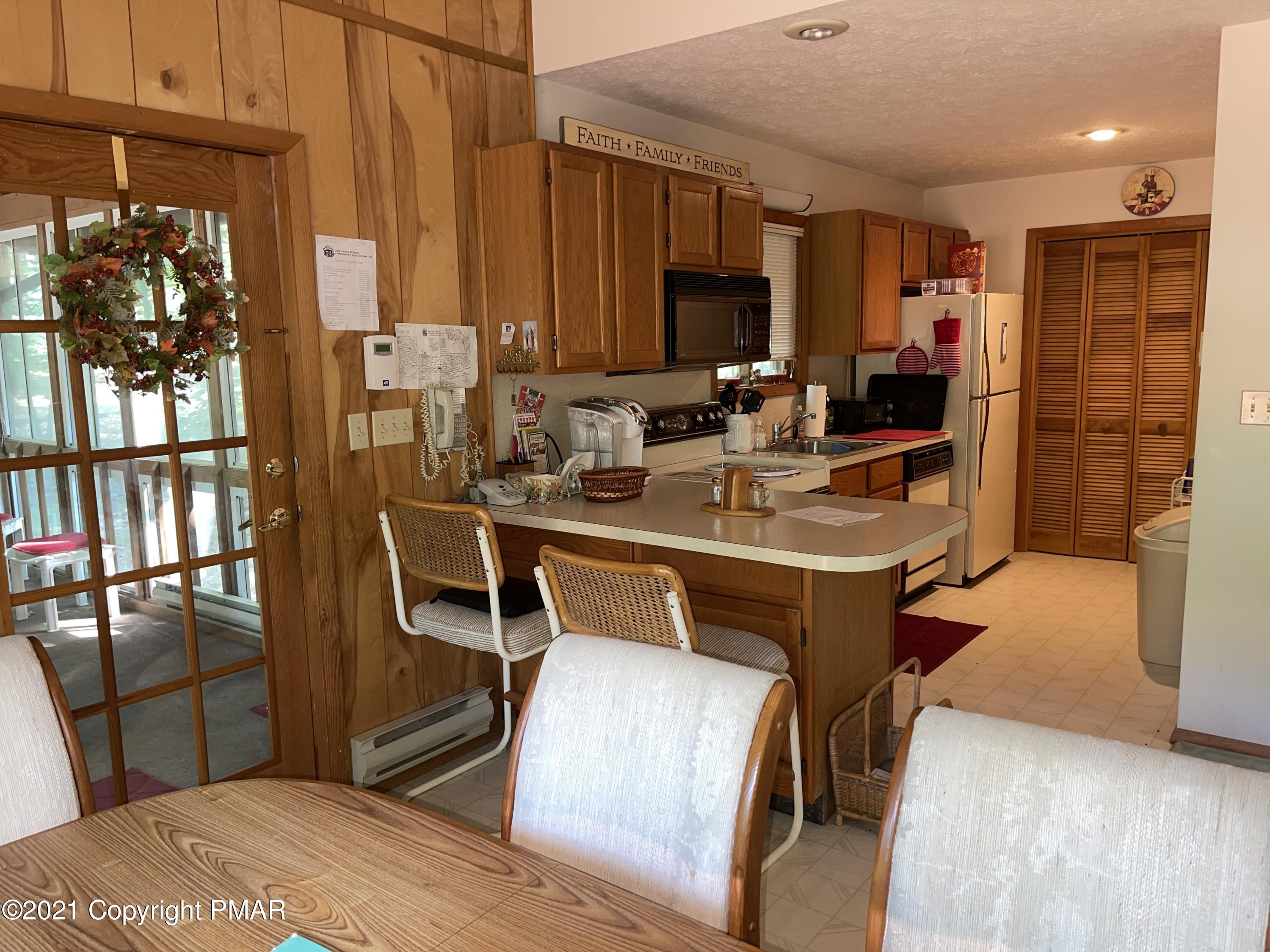 139 Dunchurch Drive Bushkill, PA 18324 - Photo 5 of 37 a view of a dining room with furniture window and outside view