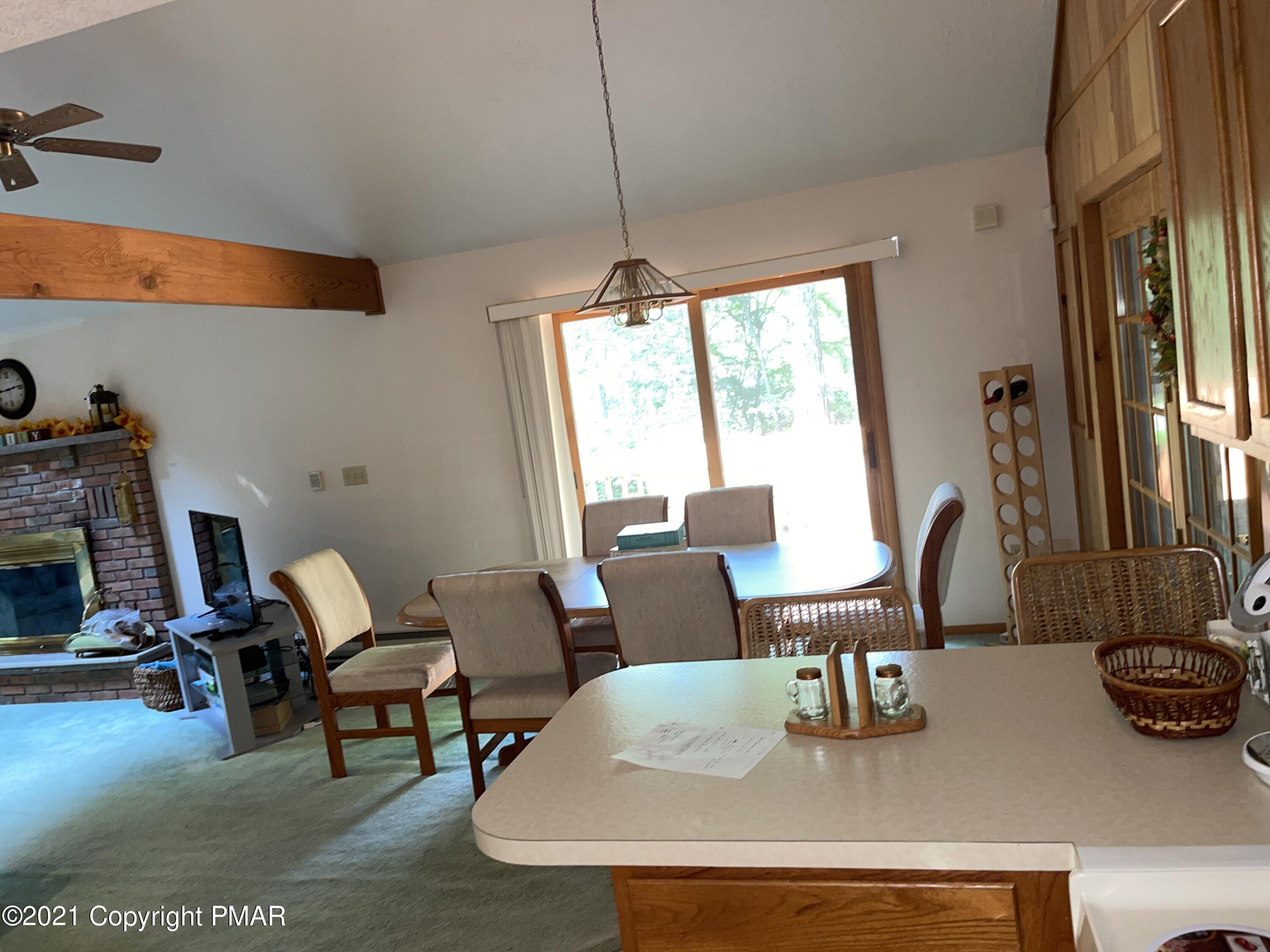 139 Dunchurch Drive Bushkill, PA 18324 - Photo 9 of 37 a dining room with furniture and a window