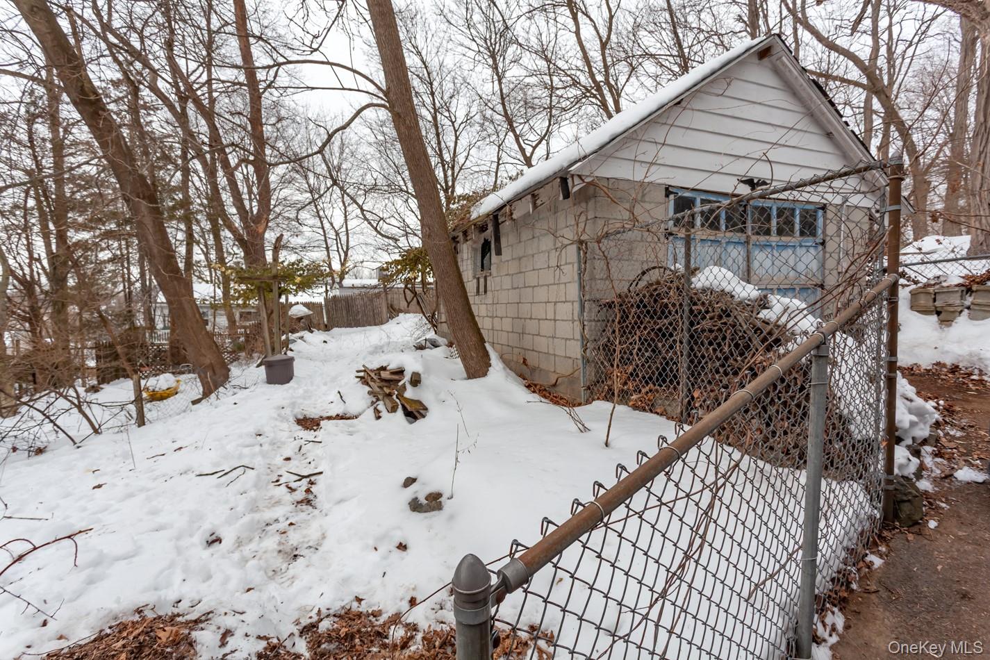 616 Union Avenue Peekskill, NY 10566 - Photo 37 of 39 a view of a house with snow on the road