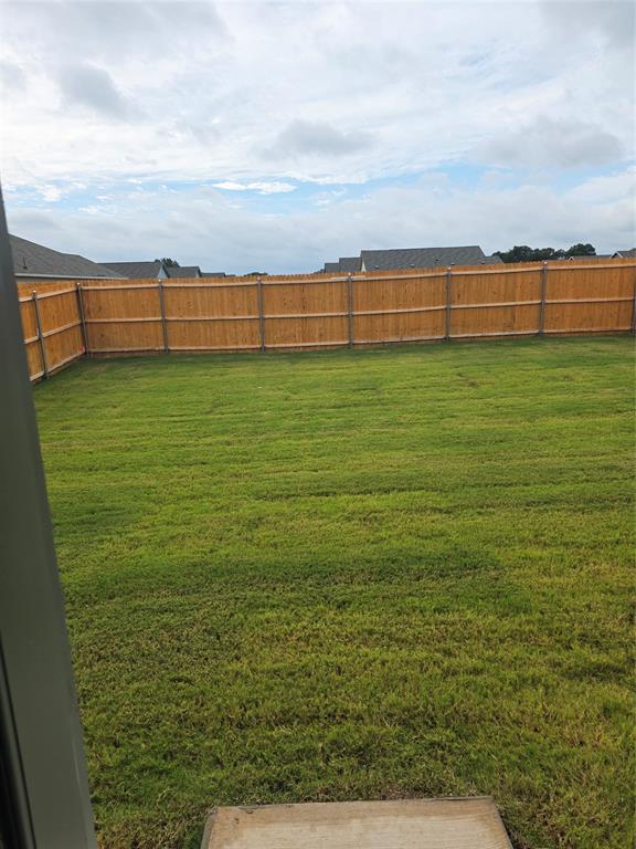 627 Montclair Avenue Princeton, TX 75407 - Photo 9 of 12 a view of an outdoor space and a yard
