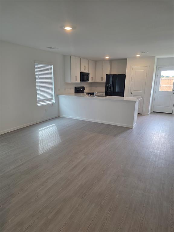 627 Montclair Avenue Princeton, TX 75407 - Photo 10 of 12 a view of kitchen with refrigerator and window