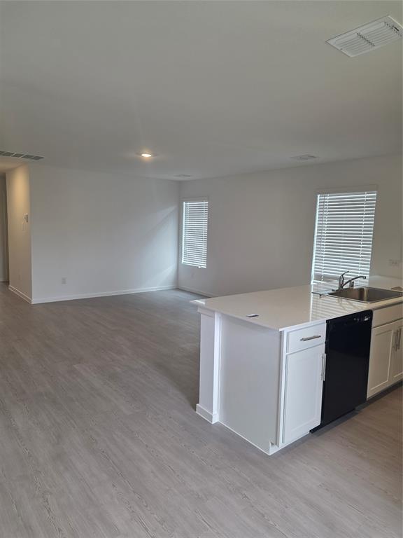 627 Montclair Avenue Princeton, TX 75407 - Photo 11 of 12 a view of an empty room with kitchen