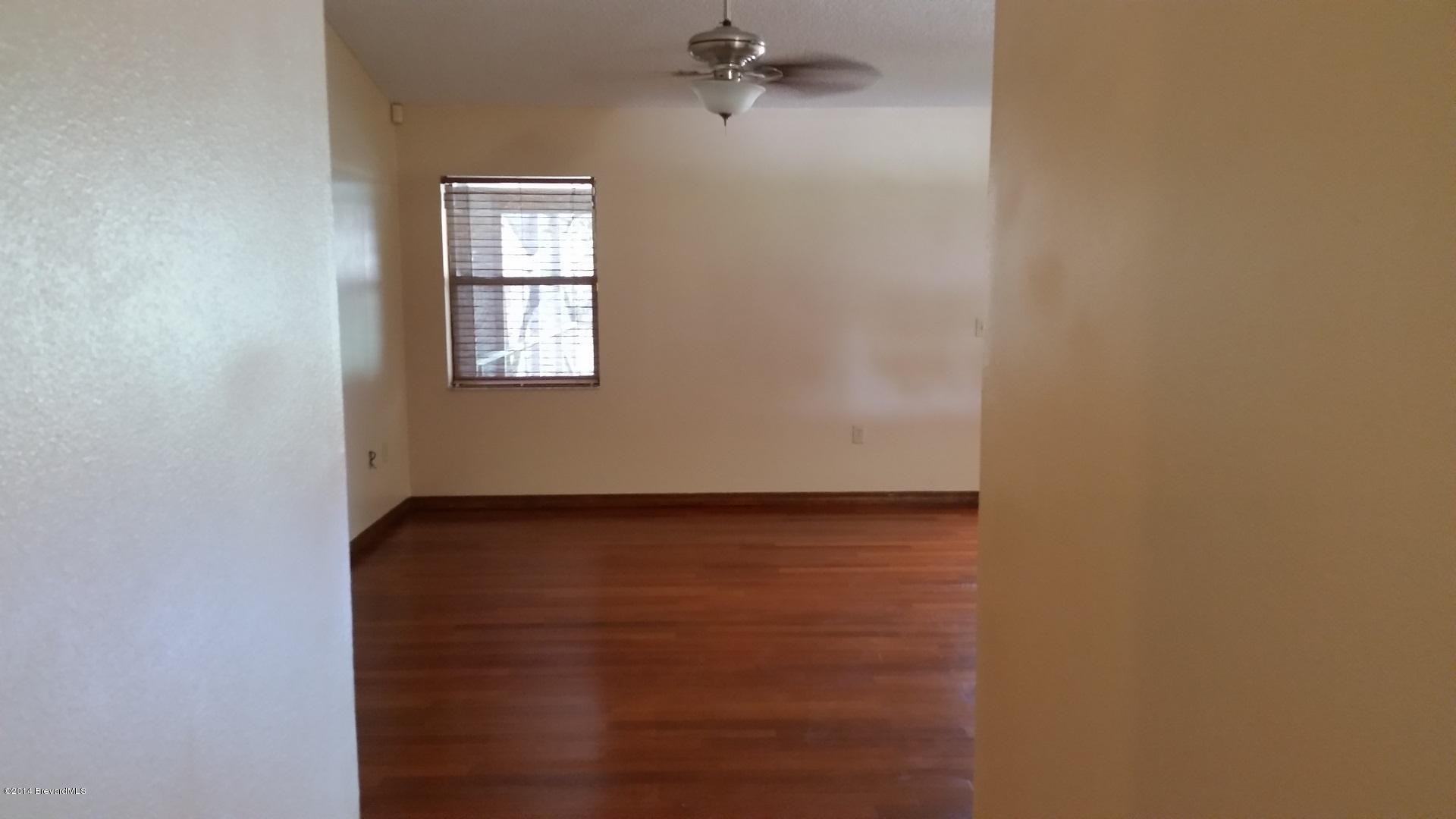 5657 Flint Road Cocoa, FL 32927 - Photo 5 of 29 Living Are From Front Entry