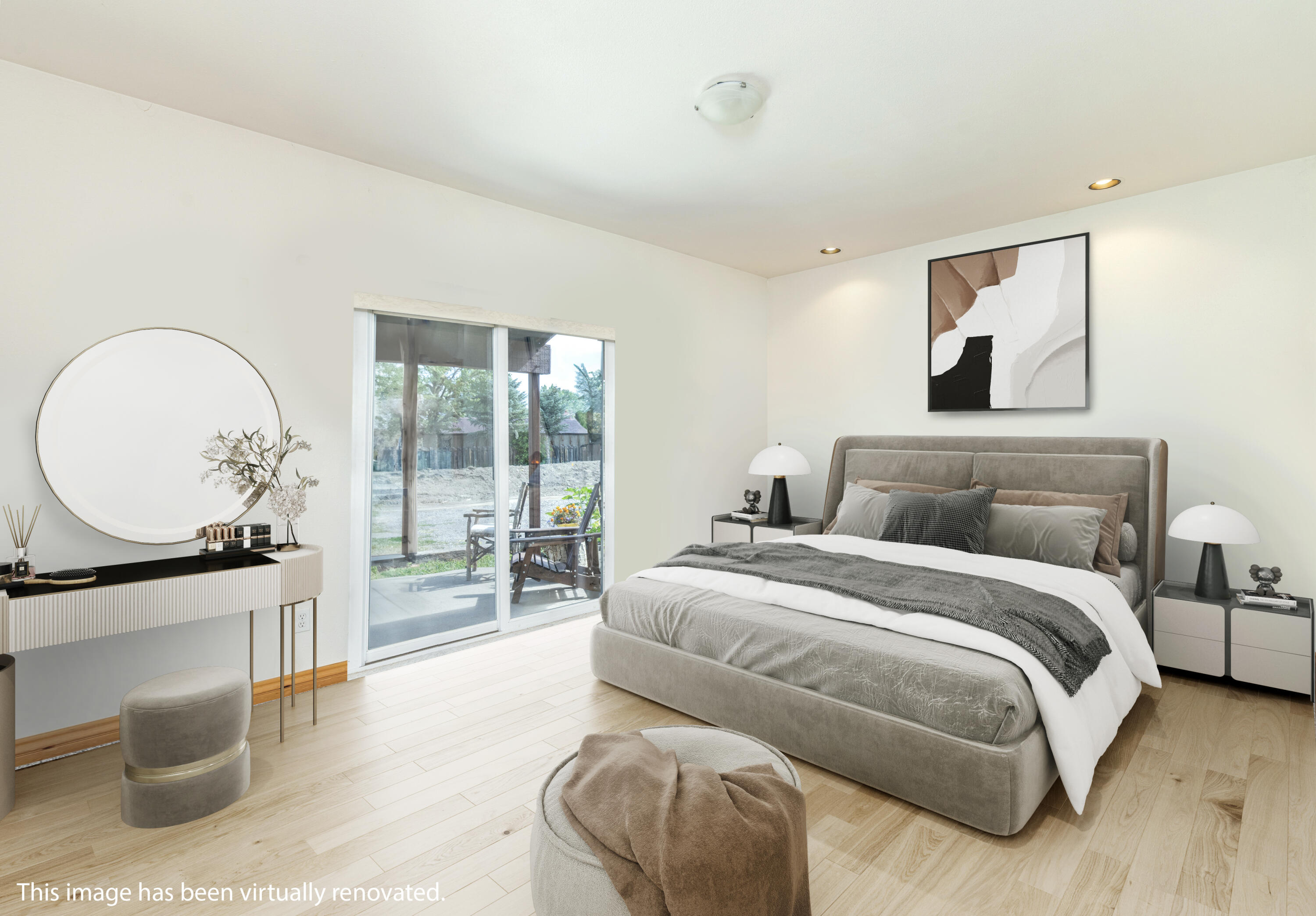 660 Otto Street Ridgway, CO 81432 - Photo 16 of 27 a spacious bedroom with a bed a mirror and lamp