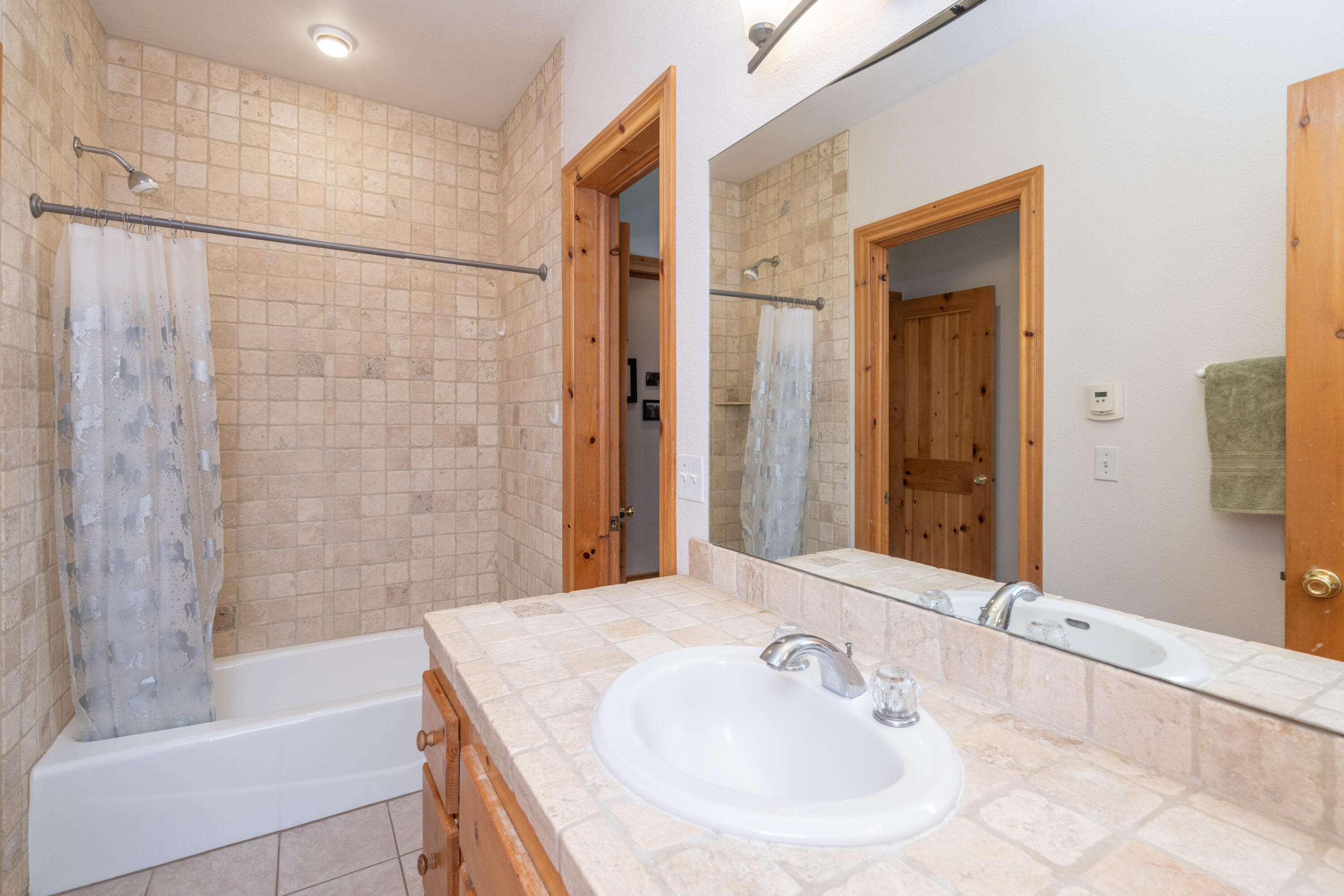 660 Otto Street Ridgway, CO 81432 - Photo 20 of 27 a bathroom with a sink and a mirror