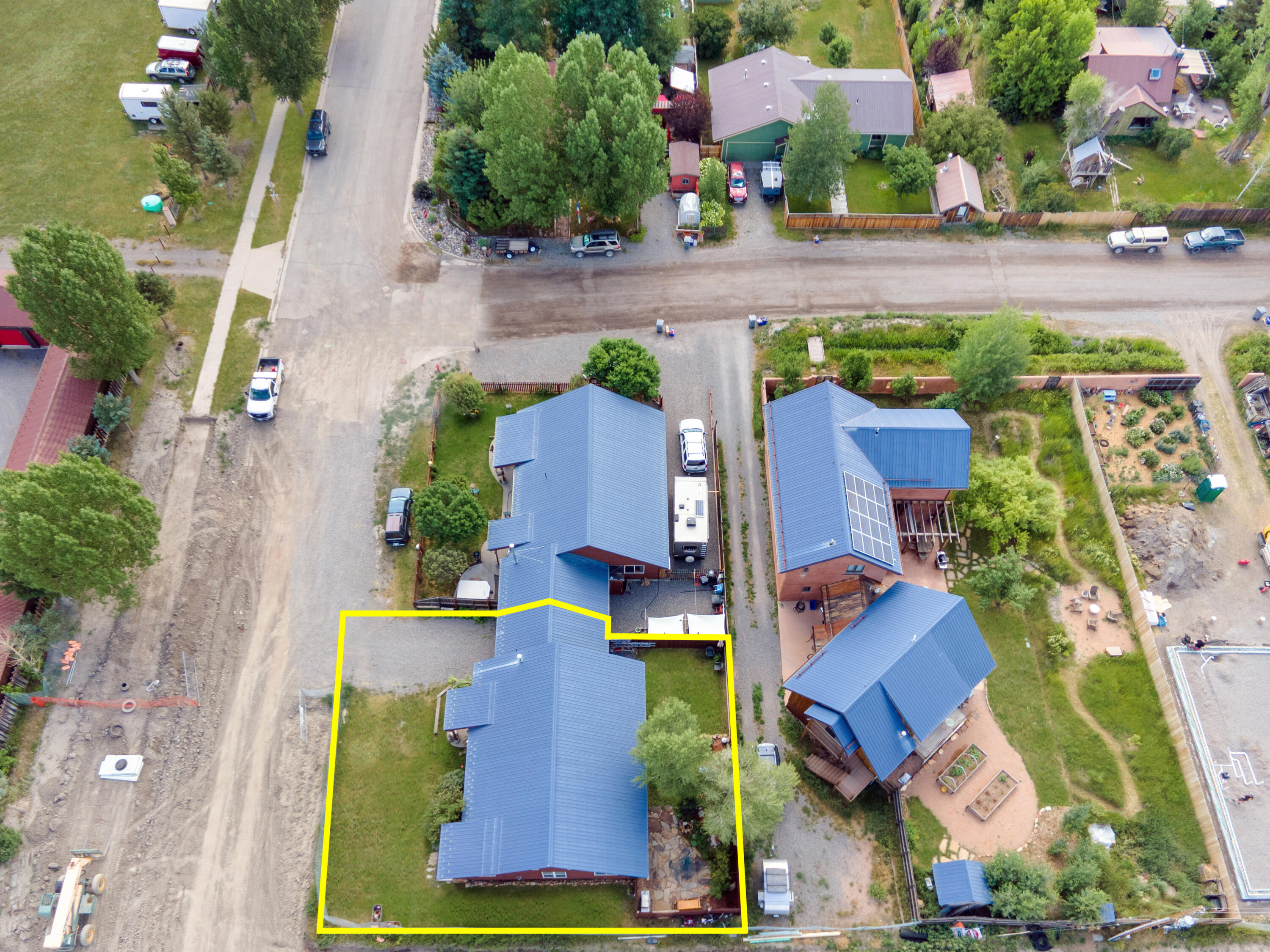 660 Otto Street Ridgway, CO 81432 - Photo 25 of 27 an aerial view of multiple houses with yard