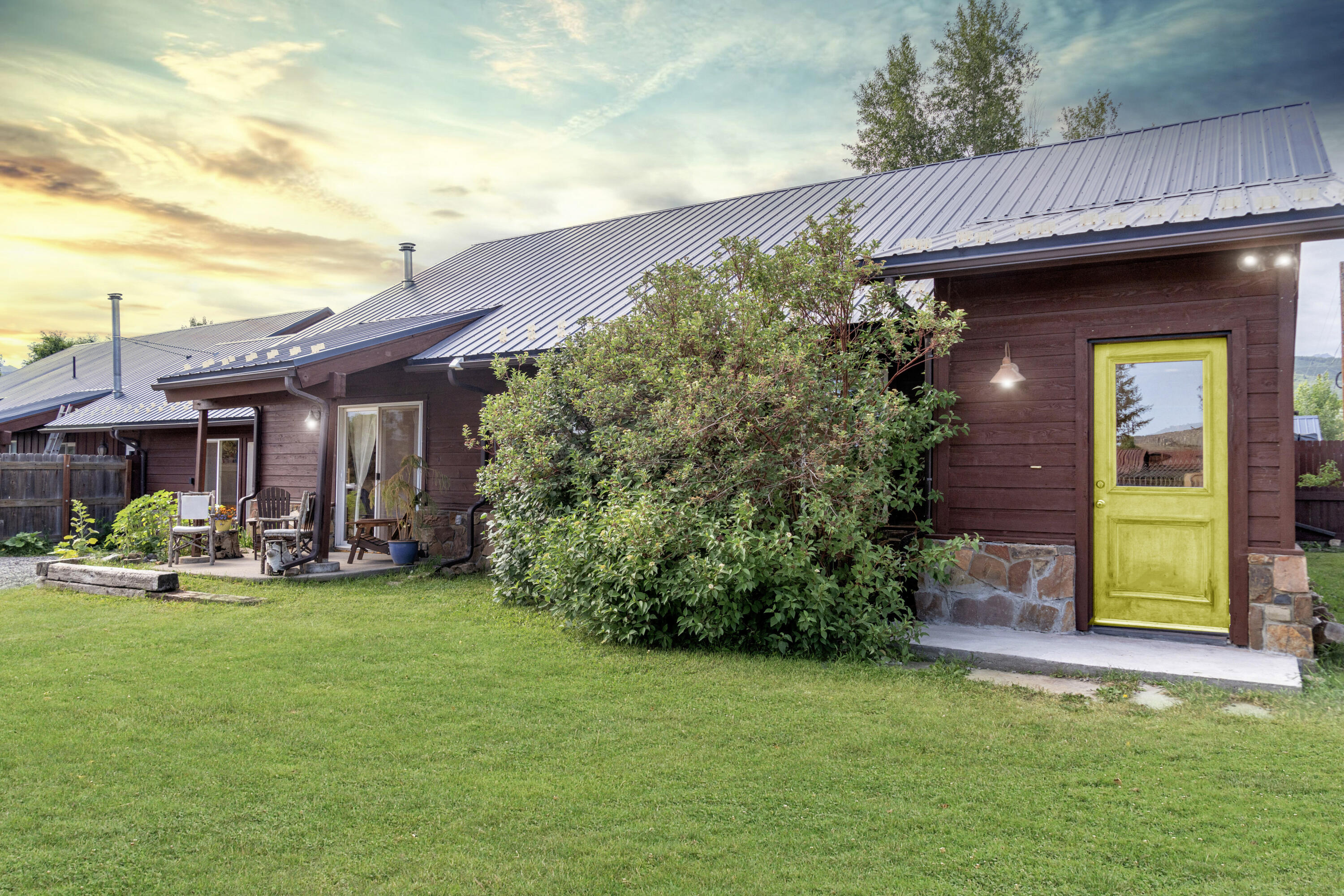 660 Otto Street Ridgway, CO 81432 - Photo 5 of 27 a front view of a house with garden