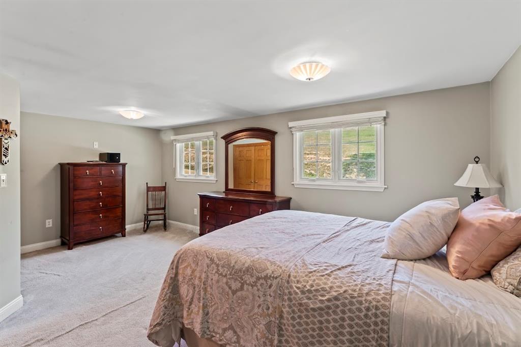 364 Sharpnack Hollow Road Jefferson, PA 15344 - Photo 22 of 31 a bedroom with a bed and a dresser