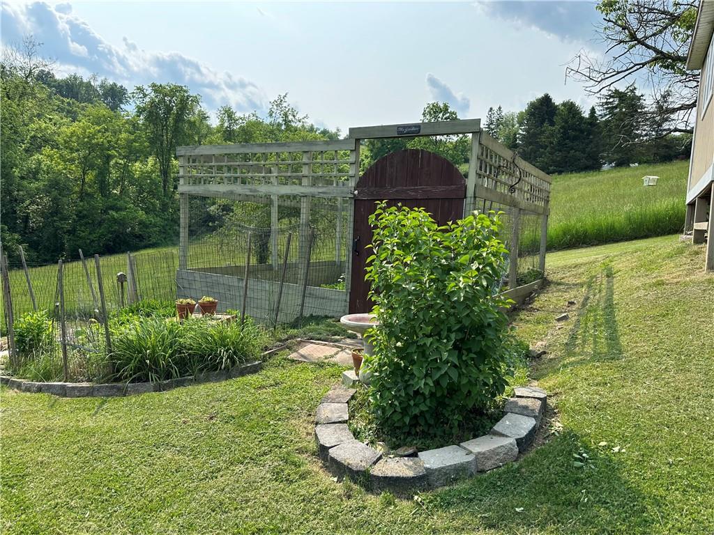 364 Sharpnack Hollow Road Jefferson, PA 15344 - Photo 10 of 31 a view of a garden
