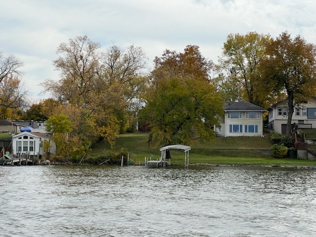 26134 Spring Grove Road Antioch, IL 60002 - Photo 2 of 33 a view of a house with a yard