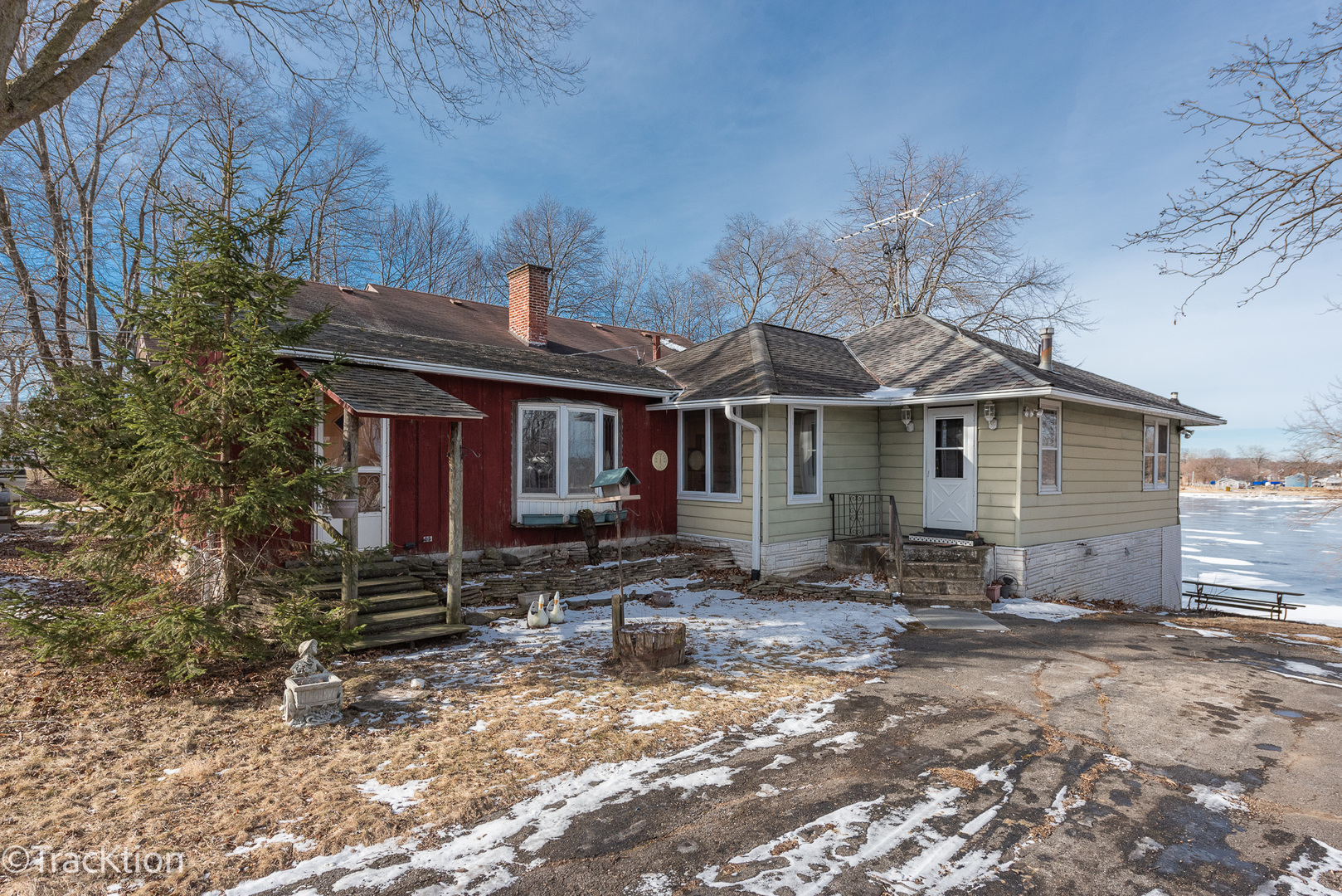 26134 Spring Grove Road Antioch, IL 60002 - Photo 5 of 33 a front view of a house with a yard