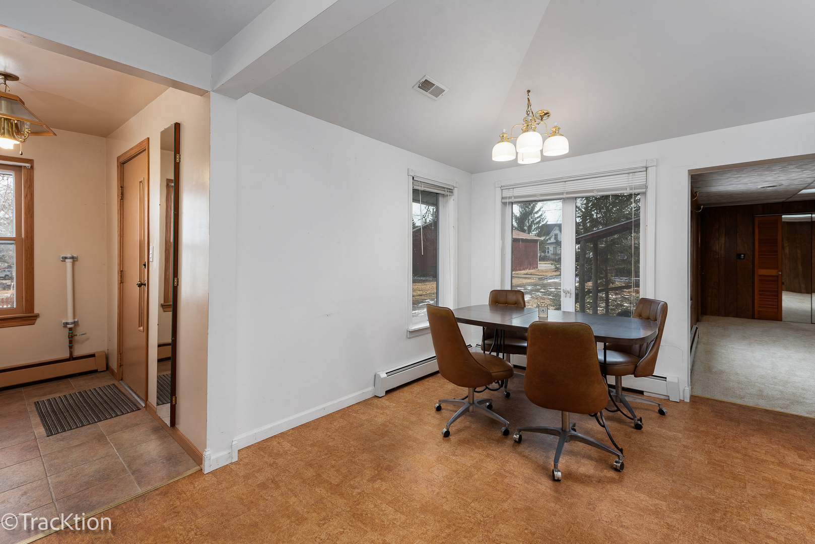 26134 Spring Grove Road Antioch, IL 60002 - Photo 7 of 33 a view of a dining room with furniture and a window