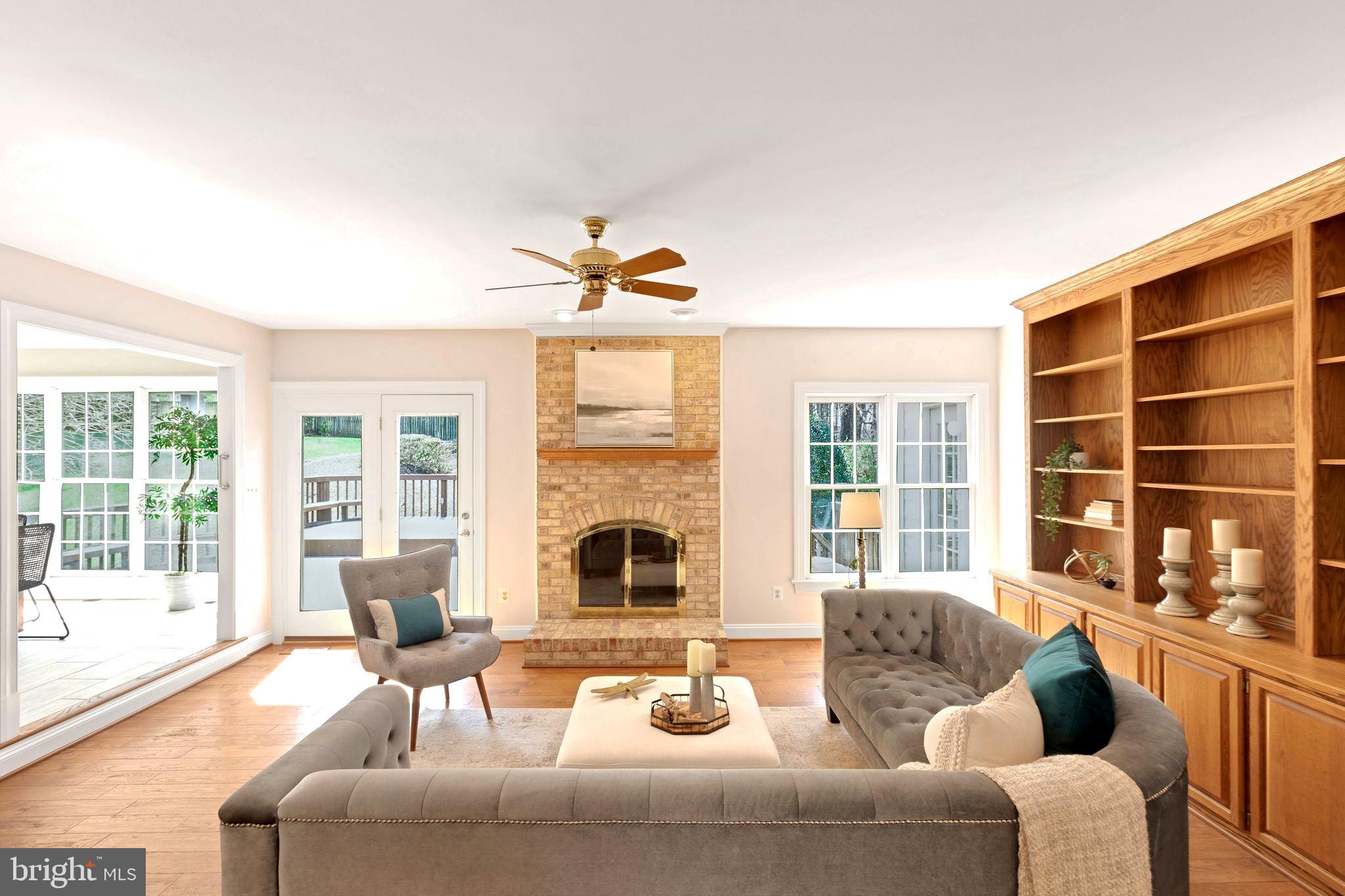 9707 Middleton Ridge Road Vienna, VA 22182 - Photo 7 of 60 a living room with furniture and a large window
