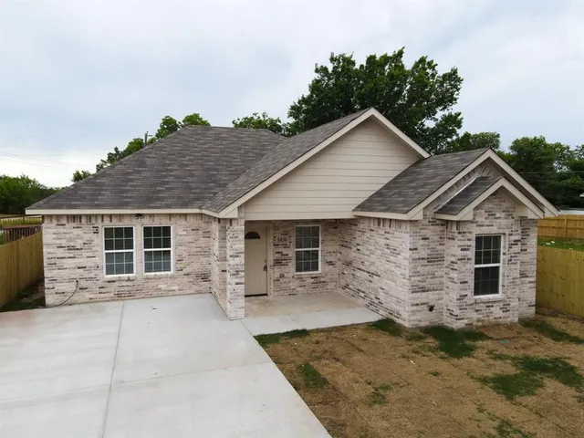 front view of a house with yard