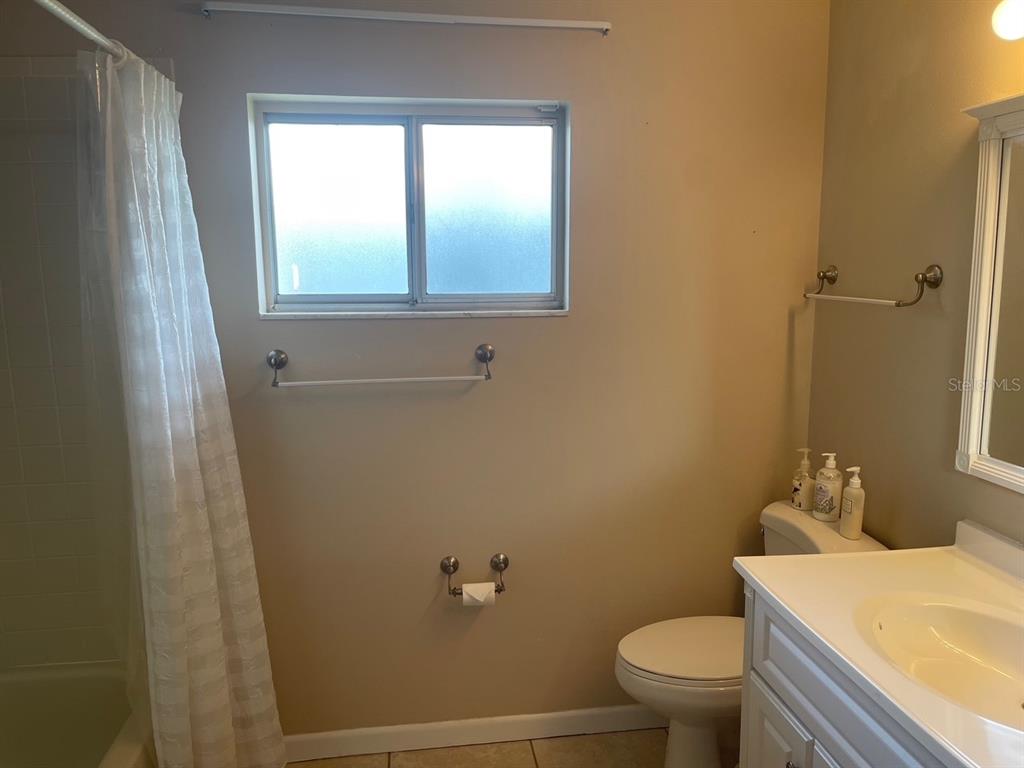 3048 Unity Tree Drive Edgewater, FL 32141 - Photo 9 of 9 a bathroom with a sink and toilet