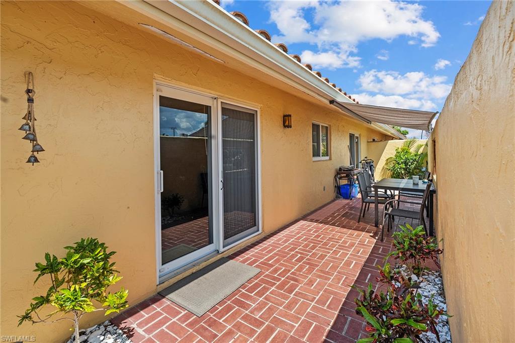 131 Teryl Road, Unit C3 Naples, FL 34112 - Photo 5 of 26 a balcony view with a outdoor seating space