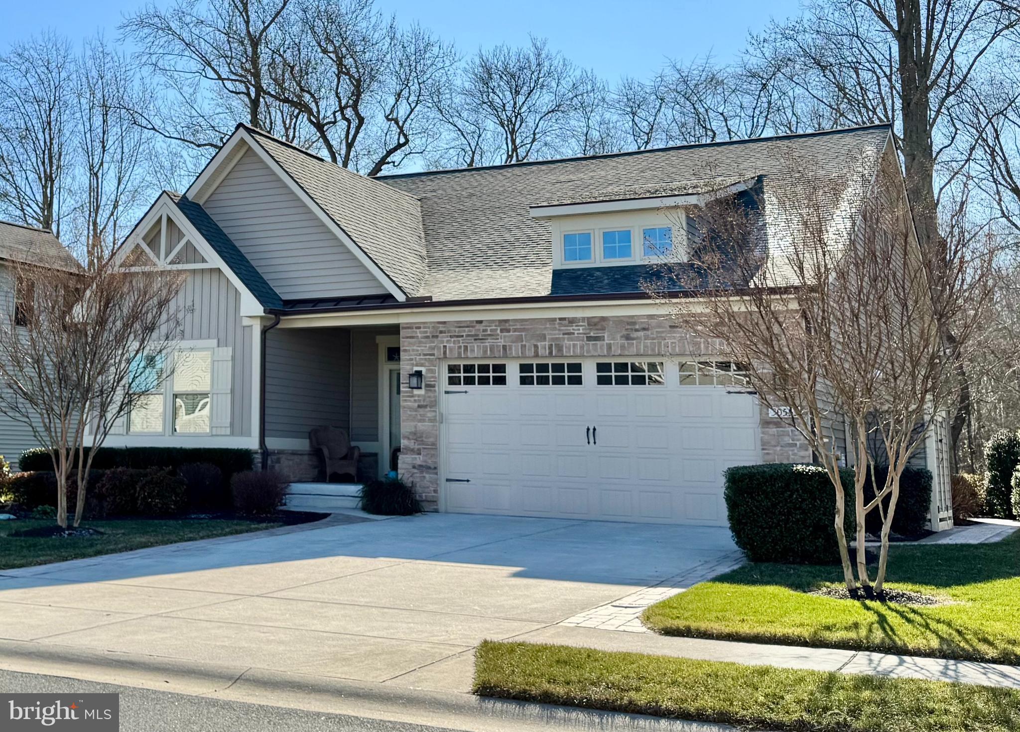 30553 Silverton Road Frankford, DE 19945 - Photo 1 of 3 a front view of a house with garden