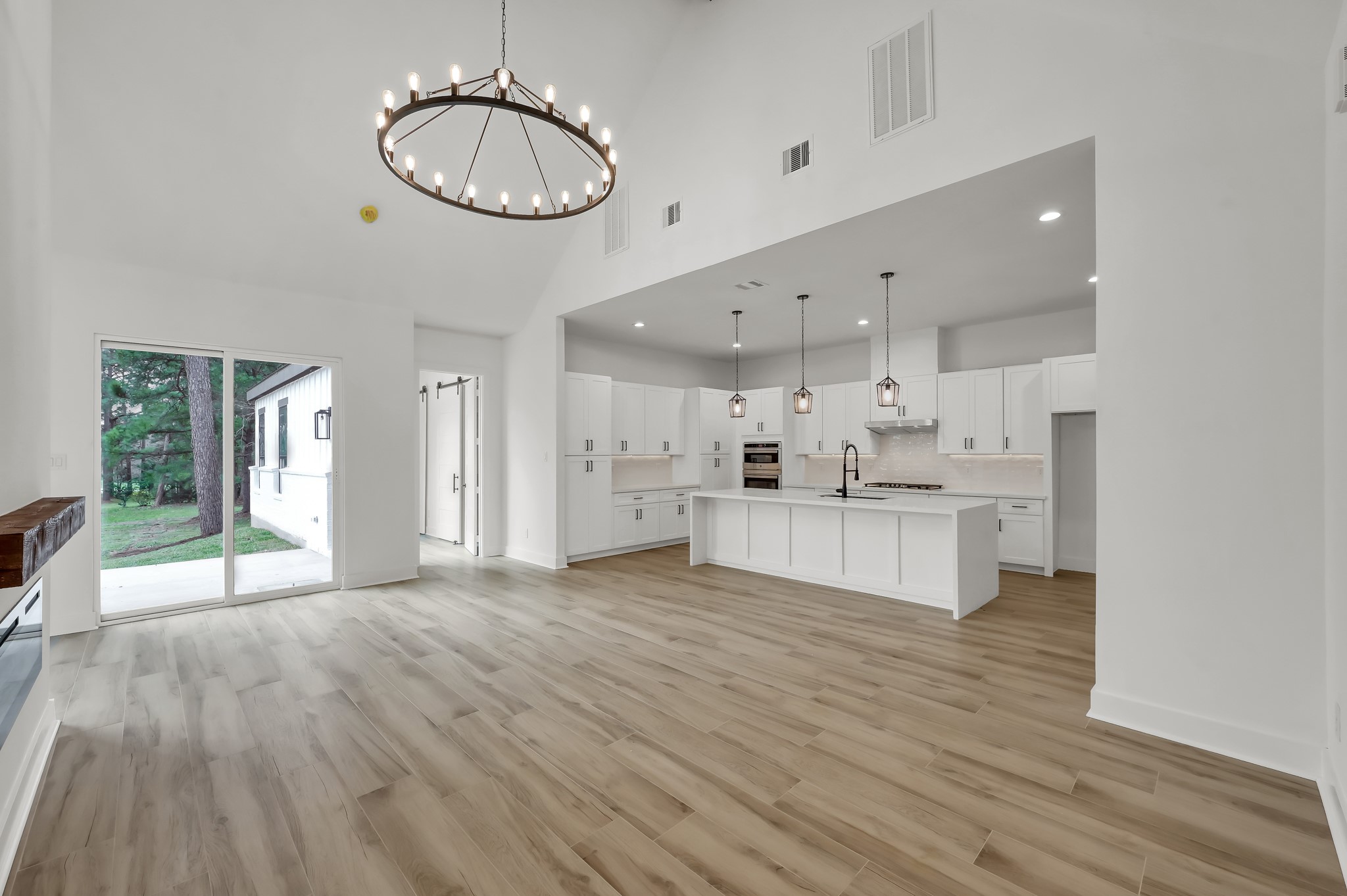 14742 Turquoise Trail Willis, TX 77378 - Photo 15 of 48 Open-concept design connects the dining room to the gourmet kitchen, creating the perfect space for entertaining and everyday living.