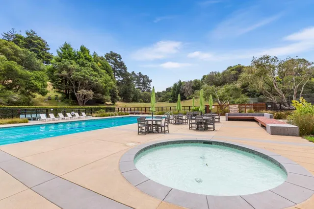 swimming pool view with a outdoor space