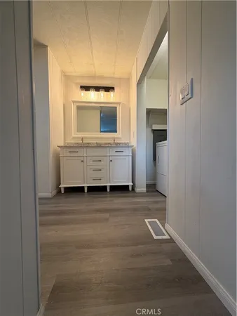a view of living room and utility room