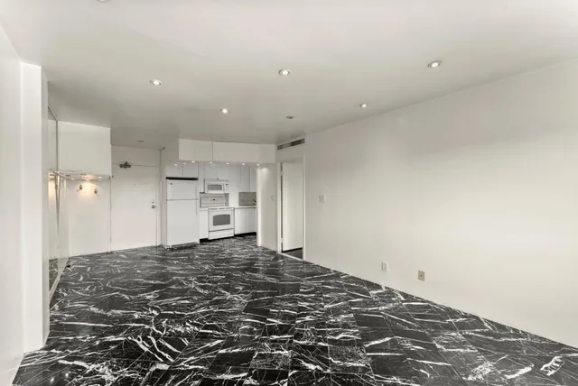 a view of a kitchen with a sink
