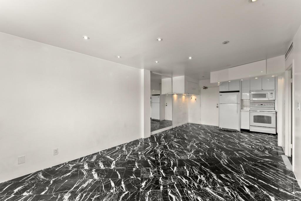 2285 Peachtree Street Northeast, Unit 801 Atlanta, GA 30309 - Photo 5 of 30 a view of a kitchen with a sink