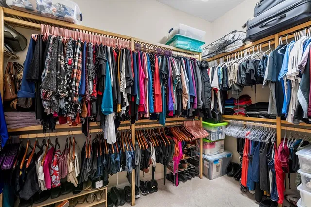 an aerial view of a balcony with seating space