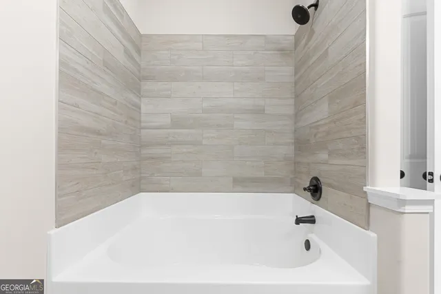 a bathroom with a bathtub