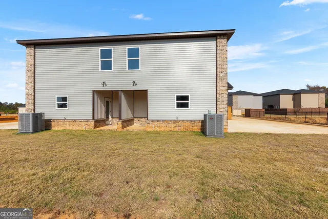 a view of a house with a patio