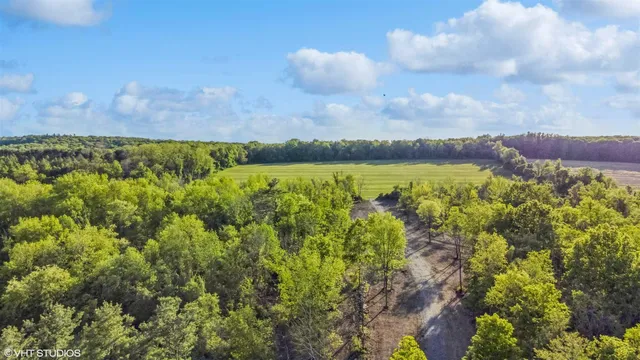 a view of a lake and sunset