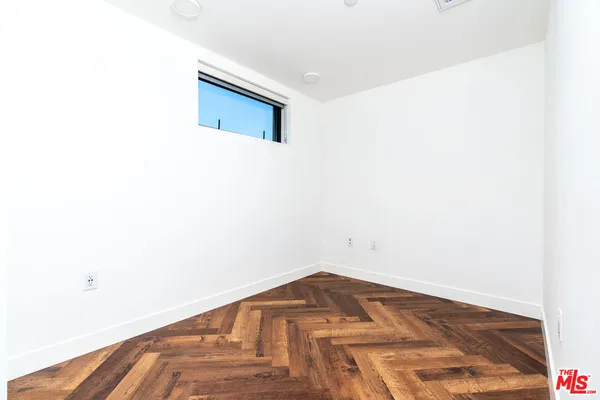 a view of small space with racks on the wall