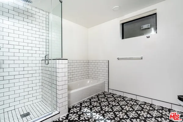 a bathroom with a sink a vanity and a toilet